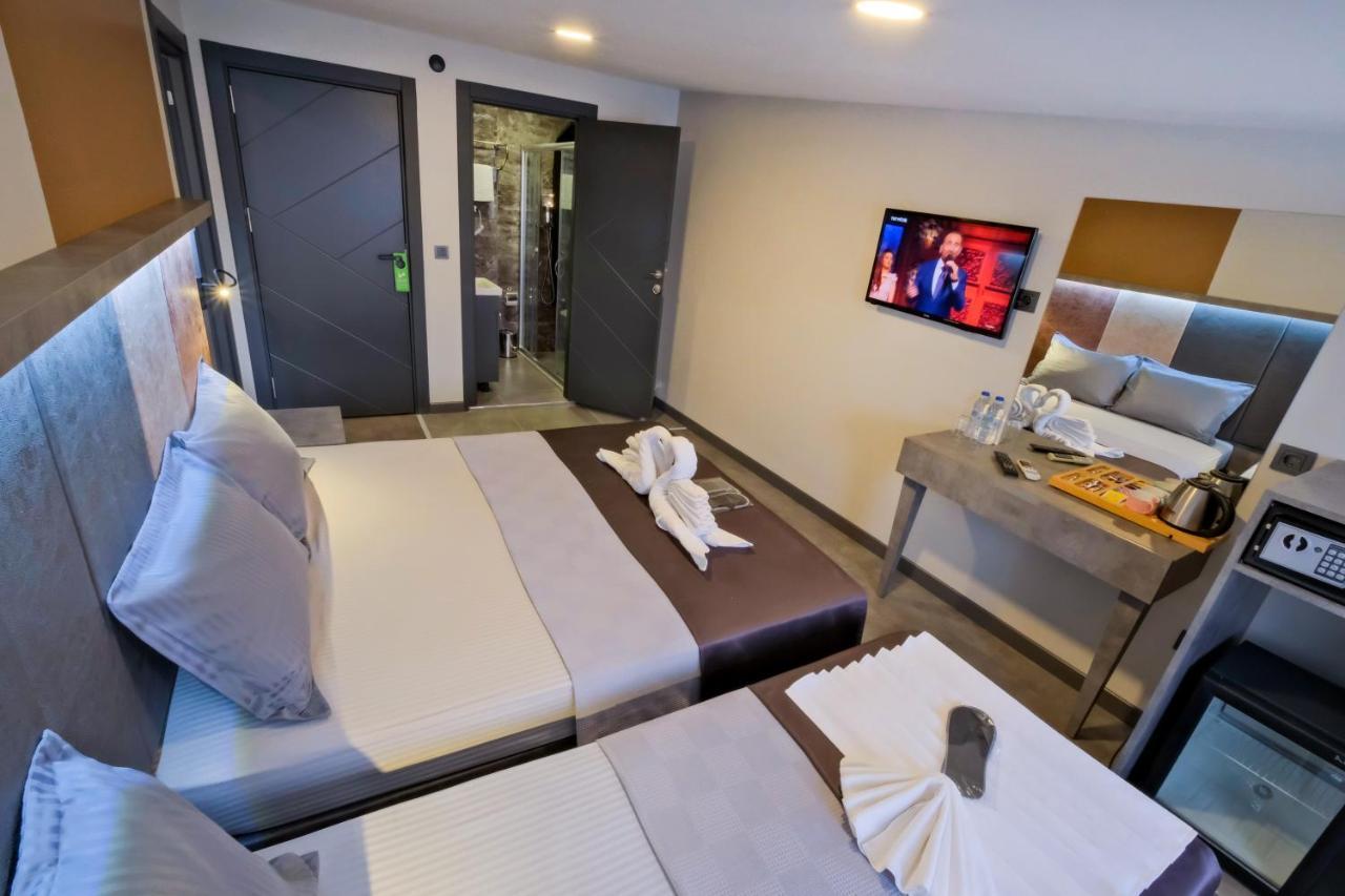 The Queen Hotel Istanbul Bagian luar foto